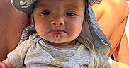 Wyatt is registered to the contest to win money with this photo: adult, baby, blue_sky, casual_clothing, child, drool, face, grass, hat, legs, nature, outdoor, person, portrait, shirt, sleeveless_top, stain, summer, sunny, turtle_print