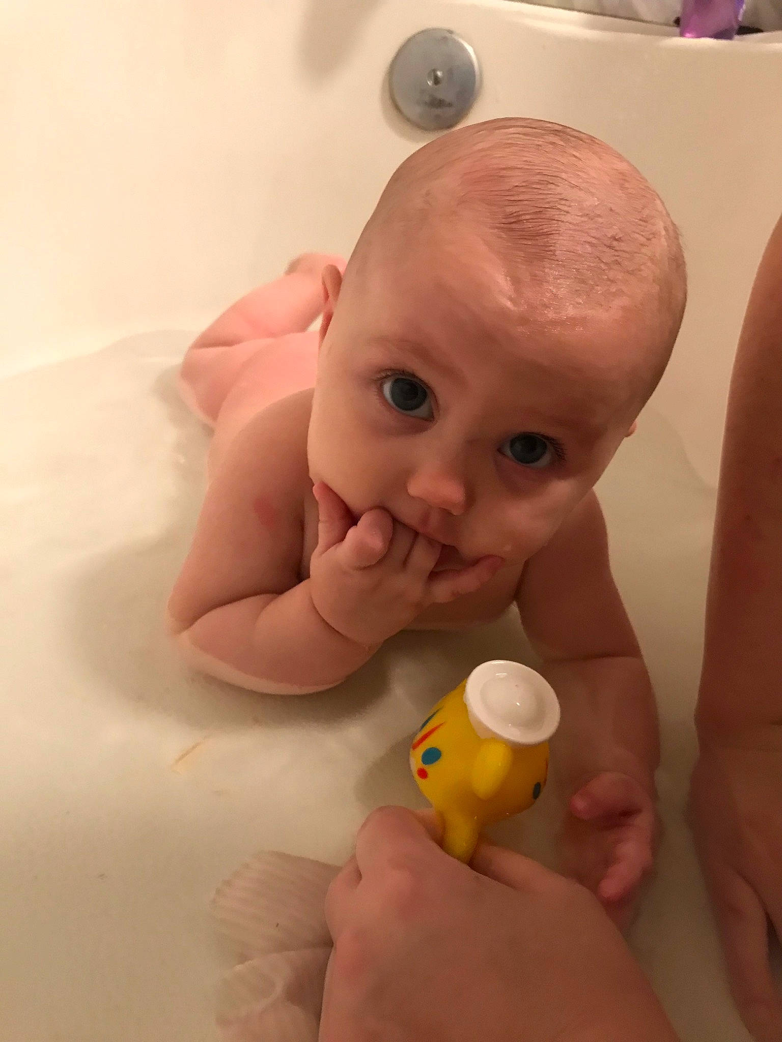 Addilynn is registered to the contest to win money with this photo: baby, baby_bathing, baby_grabbing_for_something, baby_products, bath_toy, cheek, chest, child, facial_expression, finger, flooring, fun, gesture, mouth, nail, nose, person, skin, thumb, toddler