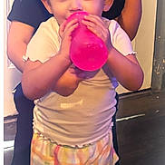Journii is registered to the contest to win money with this photo: child, children, toddler, sibling, drink, bottle, snack, braid, sandals, sneakers, indoor, floor, door, clothing, cute, happy, portrait, person, standing, playful