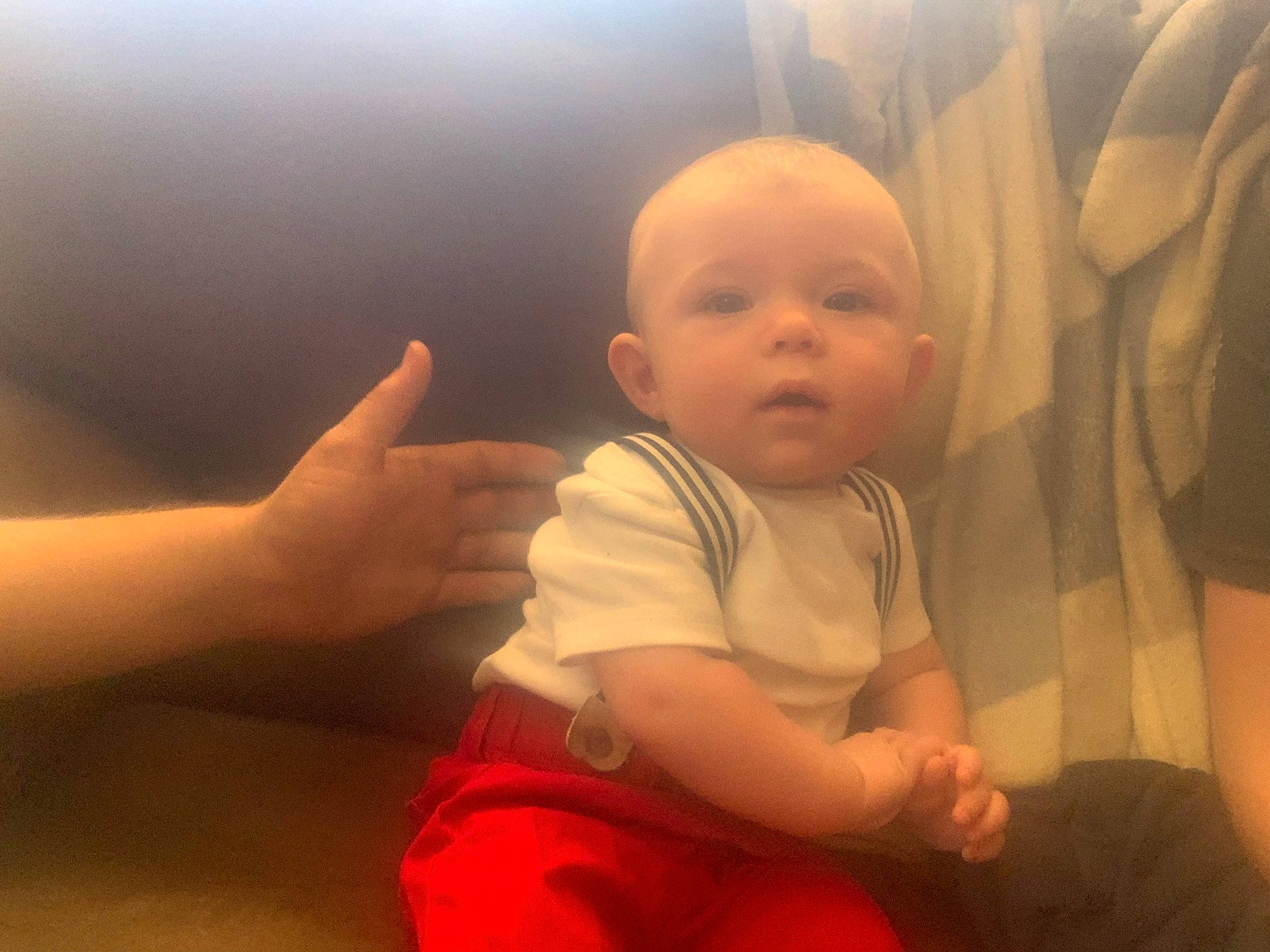 Chandler is registered to the contest to win money with this photo: abdomen, arm, baby, baby_toddler_clothing, cheek, comfort, ear, eye, finger, fun, gesture, hand, happy, head, mouth, nail, person, skin, sleeve, thumb