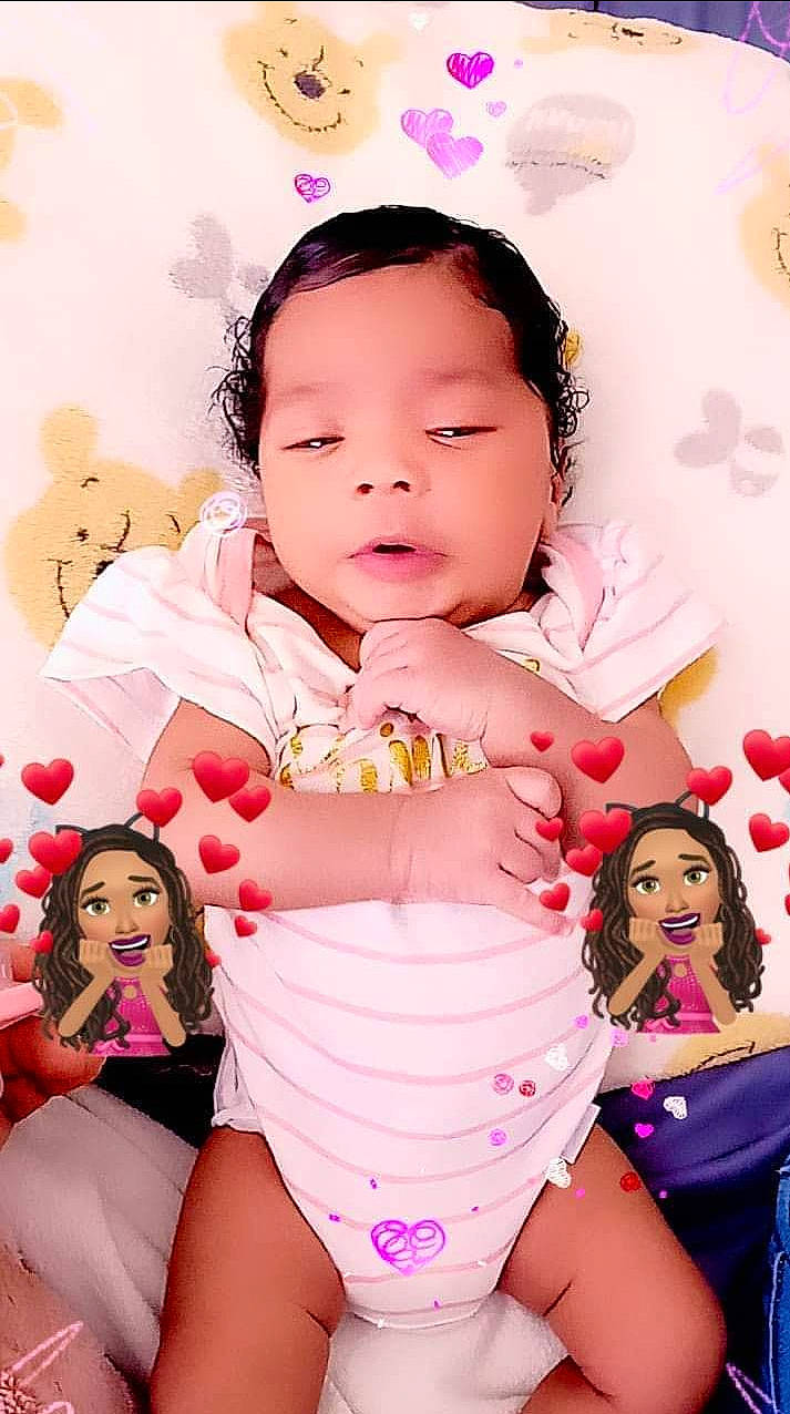 Miracle is registered to the contest to win money with this photo: baby, baby_toddler_clothing, cheek, child, face, facial_expression, finger, flash_photography, fun, gesture, happy, nail, person, pink, playing_with_kids, skin, sleeve, stomach, thigh, toddler