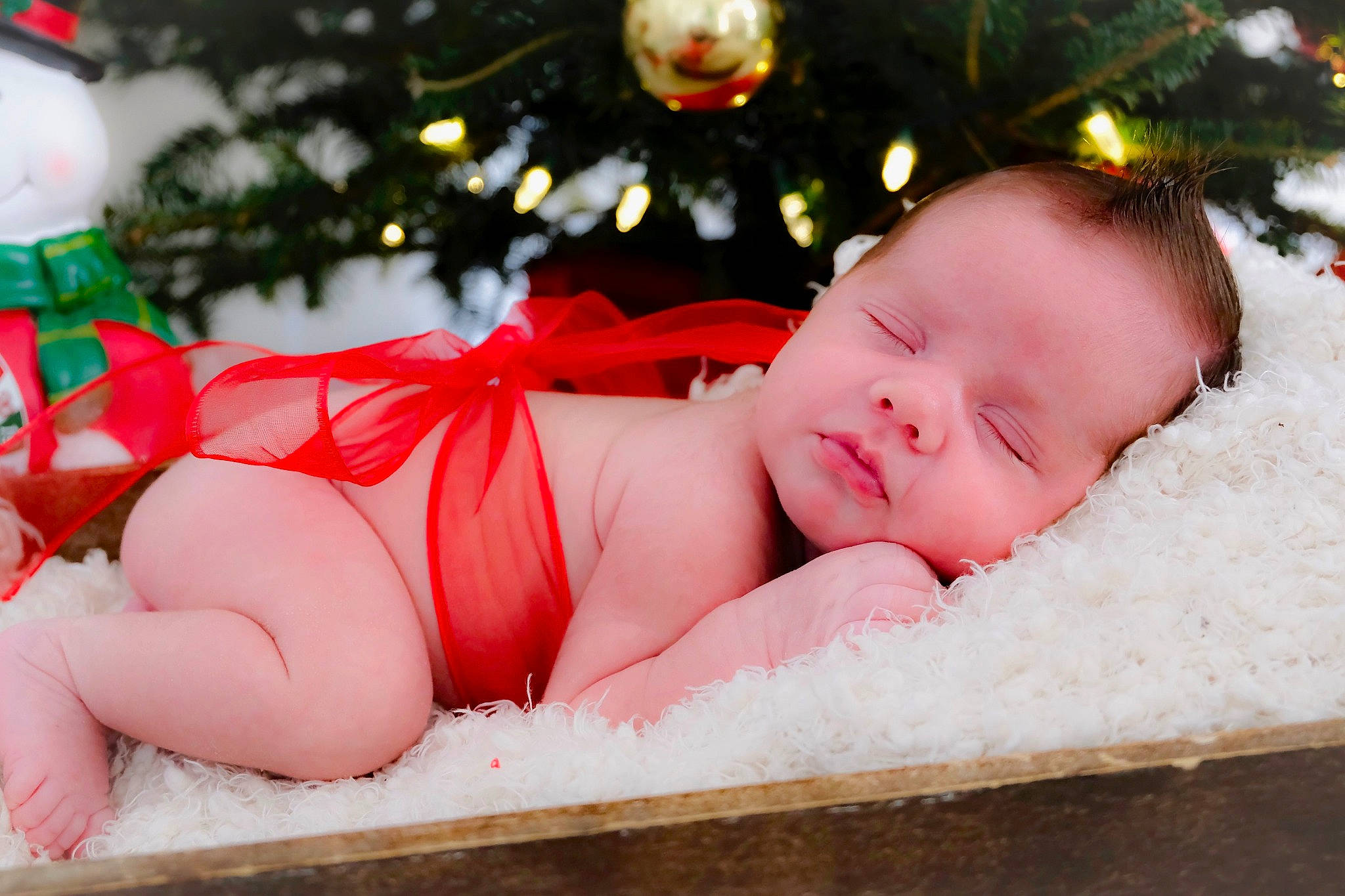 Alex is registered to the contest to win money with this photo: child, christmas, girl, happiness, holiday, infant, person, red, skin, smile, toddler