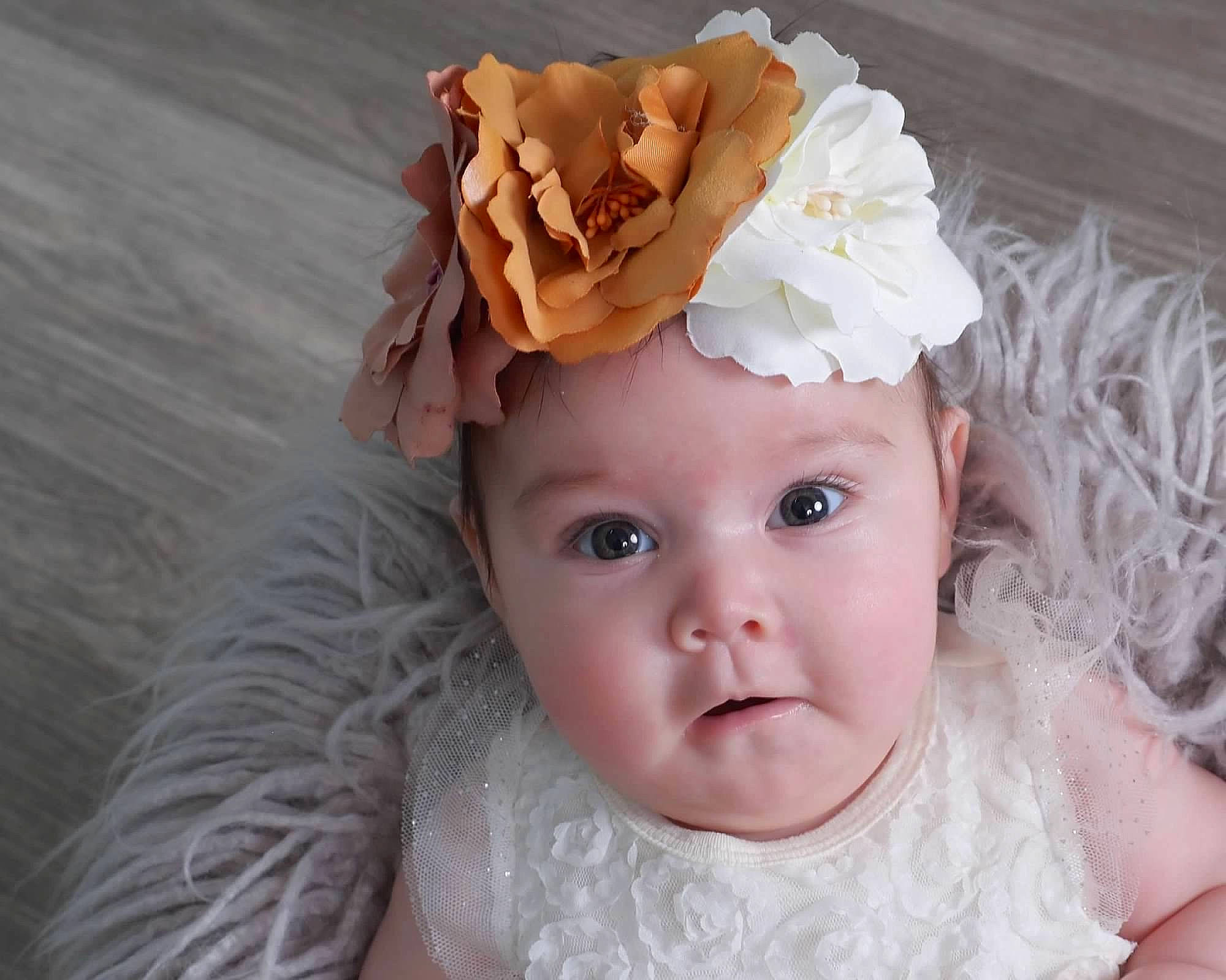 Mariella joined the competition — help win amazing prizes! baby, baby_toddler_clothing, bridal_accessory, child, costume_hat, cut_flowers, embellishment, eyelash, flower, hair_accessory, happy, headband, headgear, headpiece, headwear, person, petal, pink, skin, textile