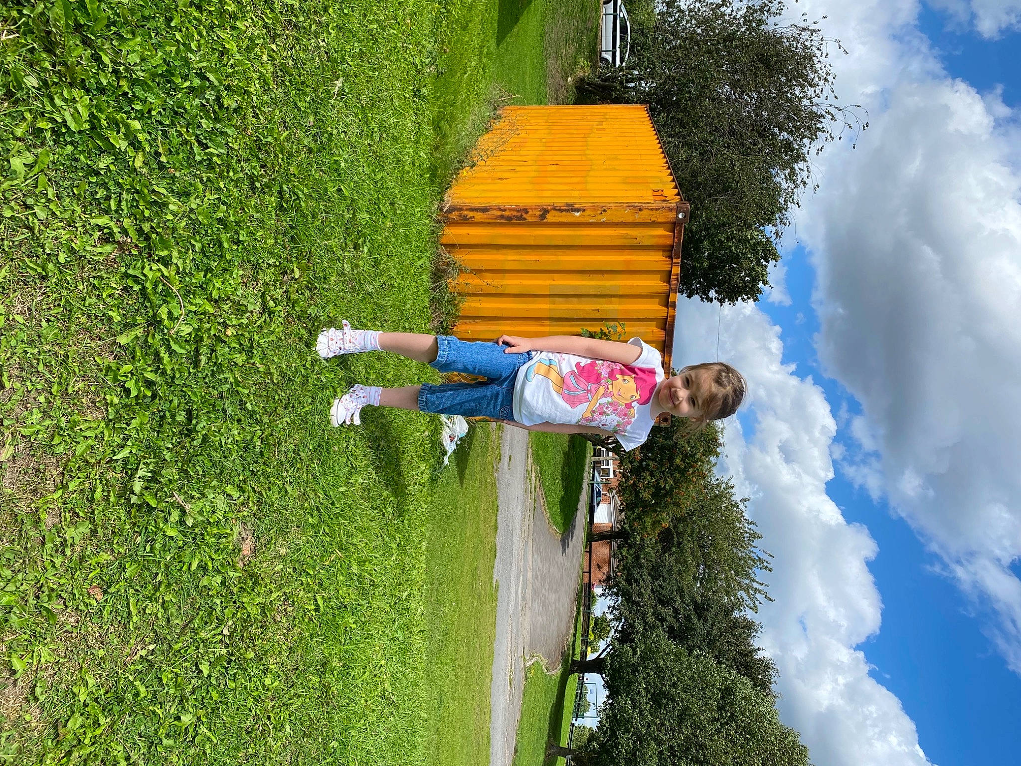 Elise Rose Ramsden is registered to the contest to win money with this photo: adventure, blue, cloud, fun, grass, grassland, green, joy, landscape, leisure, nature, people_in_nature, person, plant, pole, recreation, shadow, shrub, sky, smile