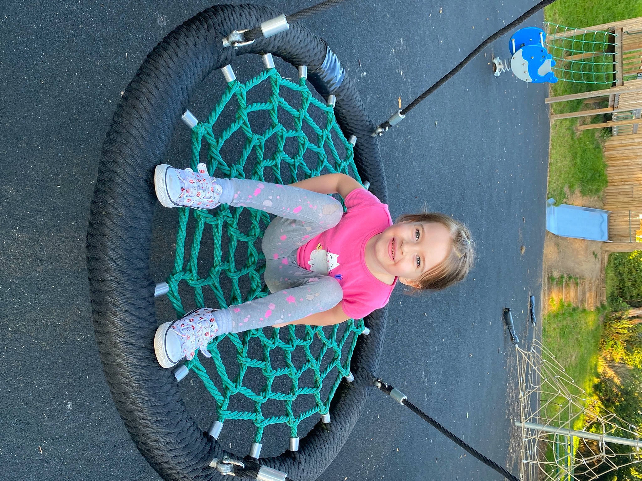 Elise Rose Ramsden is registered to the contest to win money with this photo: asphalt, automotive_tire, circle, electric_blue, fun, grass, green, joy, leisure, magenta, pattern, people_in_nature, person, pink, plant, recreation, road_surface, sidewalk, snapshot, textile