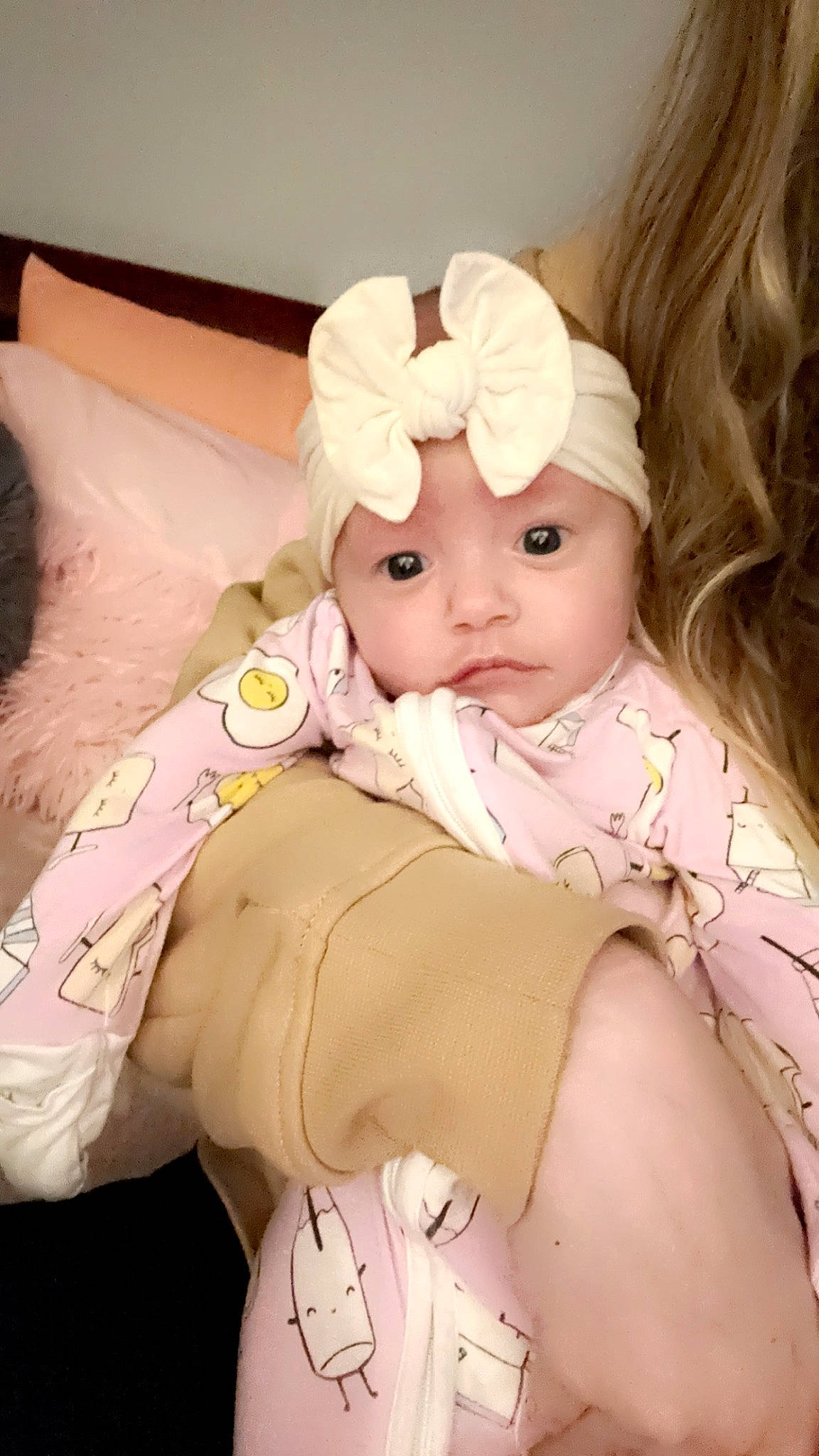 Octavia is registered to the contest to win money with this photo: baby, baby_toddler_clothing, cheek, child, comfort, doll, dress, eye, eyelash, happy, head, headband, headgear, headpiece, headwear, human_body, lip, person, pink, skin