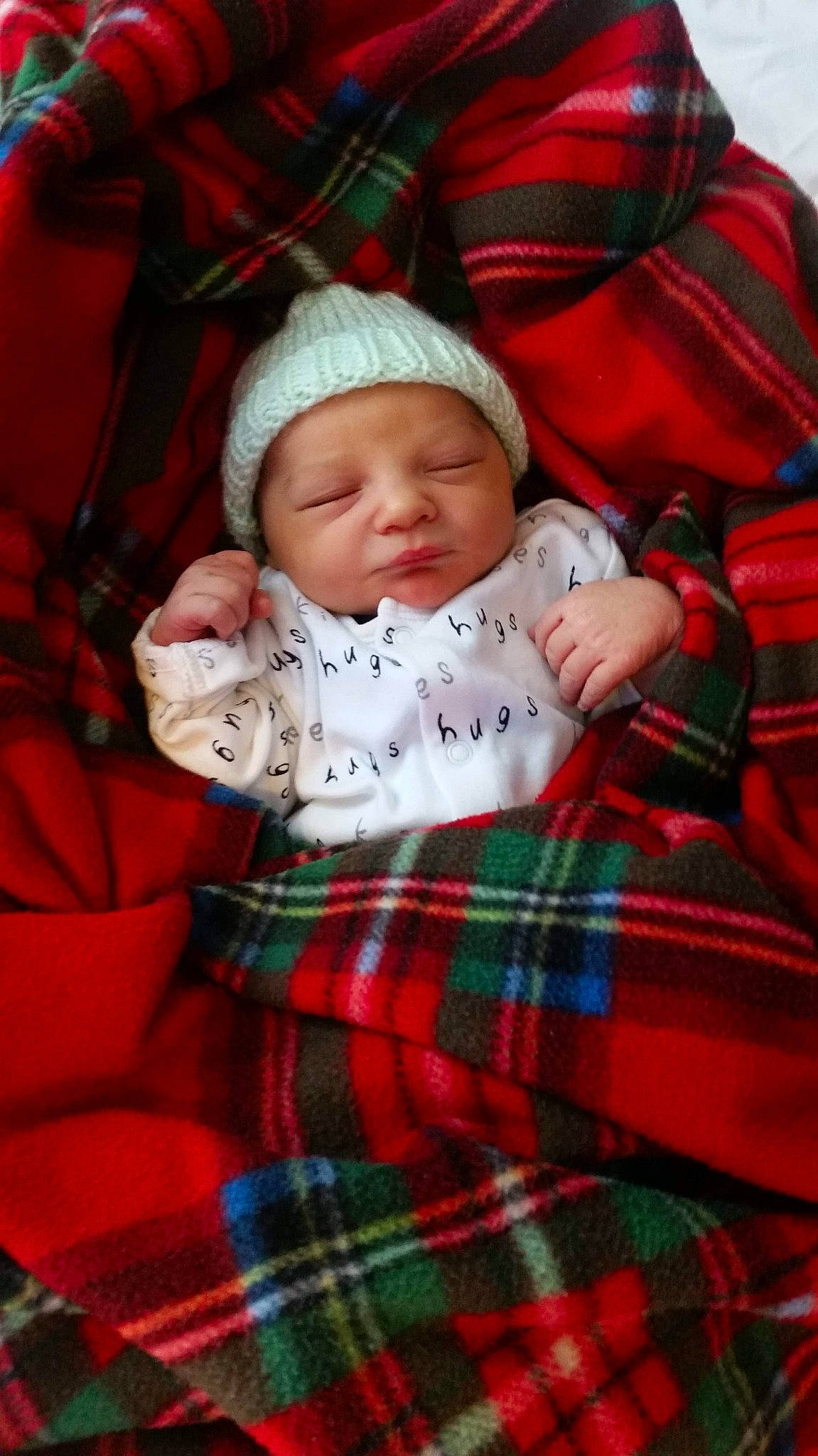 Kaiden-lee is registered to the contest to win money with this photo: baby, child, christmas, christmas_eve, design, headwear, holiday, pattern, person, plaid, tartan, textile, toddler