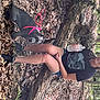Majestic is registered to the contest to win money with this photo: black_hair, boot, eyewear, flash_photography, forest, fun, grass, human_leg, knee, long_hair, people_in_nature, plant, shorts, sitting, soil, thigh, tree, trunk, wood