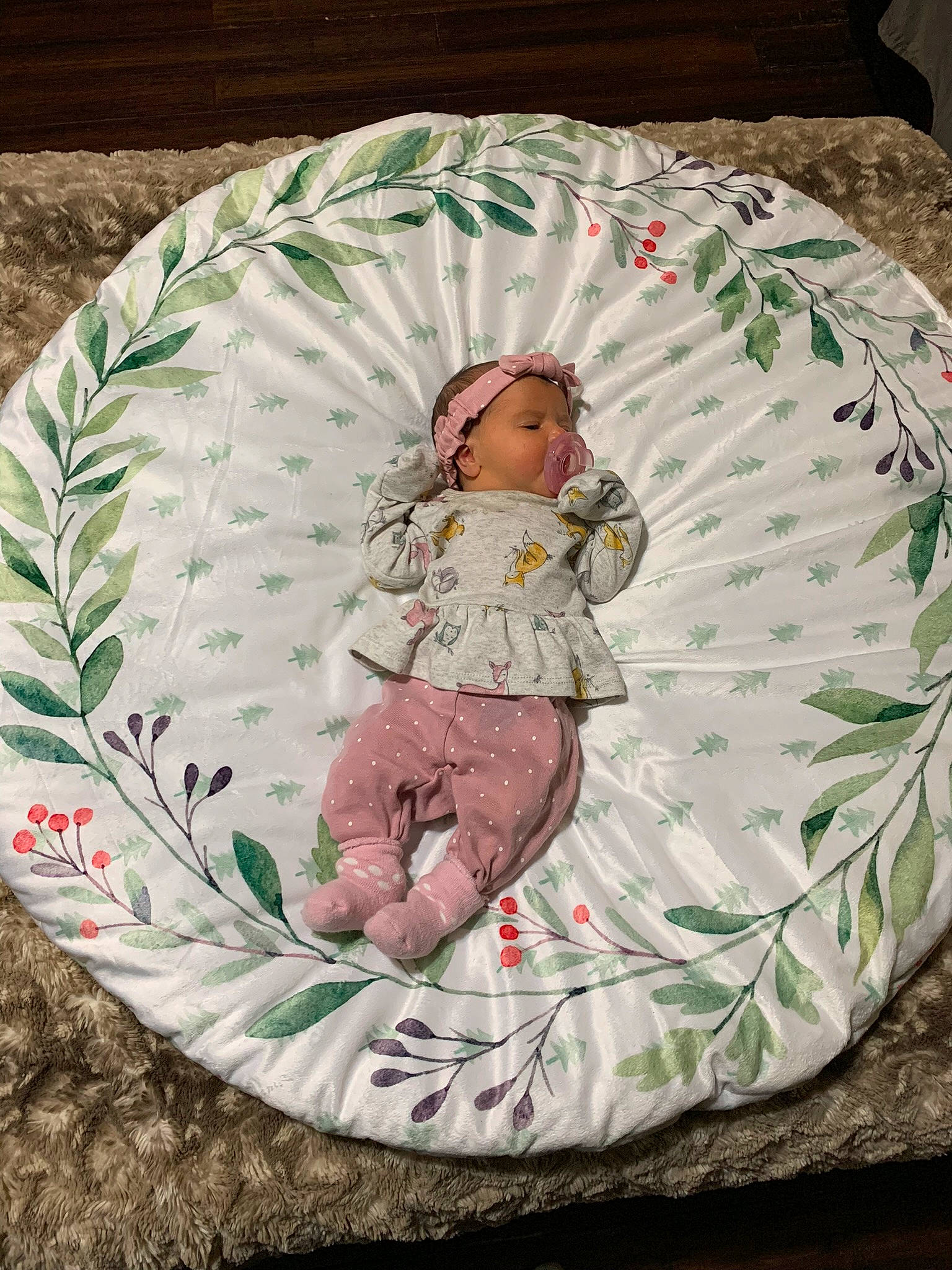 Rosemary joined the competition — help win amazing prizes! baby, baby_products, baby_safety, baby_sleeping, baby_toddler_clothing, bed, bedding, child, circle, clothing, comfort, face, grass, headwear, human_body, linens, pattern, person, sleeve, textile