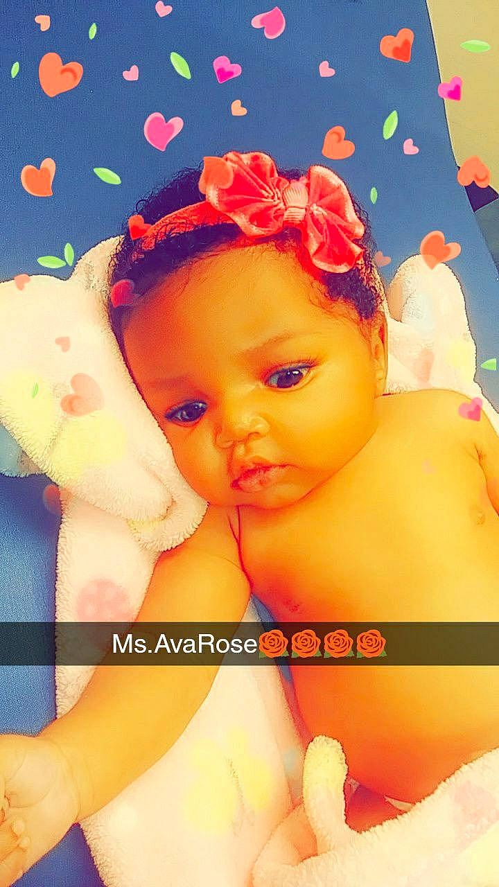 Avarose is registered to the contest to win money with this photo: cheek, child, close_up, finger, fun, girl, hair_accessory, hand, happiness, infant, lip, mouth, person, petal, product, skin, toddler, yellow