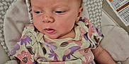 Karissa joined the competition — help win amazing prizes! baby, baby_seat, blanket, bunny, child, comfort, cushion, cute, floral_pattern, indoors, infant, onesie, person, plush_toy, relaxing, resting, sleepy, soft_toy, wearing_clothes, young_child