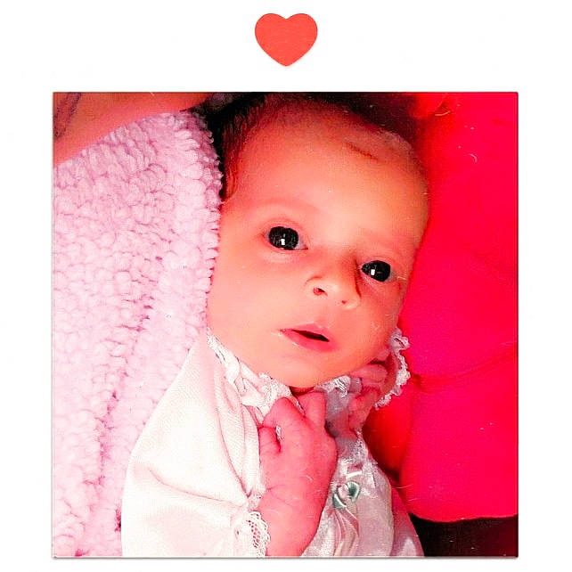 Evangeline is registered to the contest to win money with this photo: baby, beauty, cheek, child, child_model, ear, eye, face, head, lip, mouth, nose, person, photograph, photography, pink, skin, smile, stock_photography, toddler