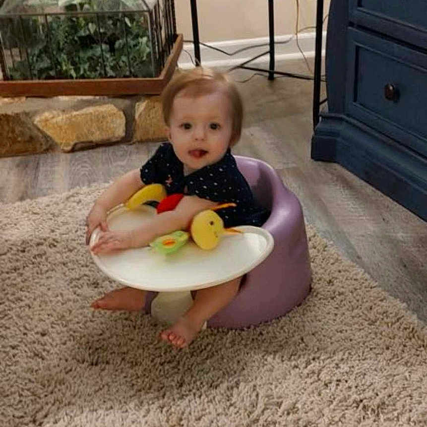 Mallory is registered to the contest to win money with this photo: animal, baby, bathroom, cabinet, diningtable, face, furniture, head, homedecor, indoors, interiordesign, person, photography, plant, portrait, pottedplant, room, table, toilet, water