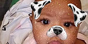 Za'Nyla is registered to the contest to win money with this photo: baby, infant, face_filter, dog_filter, ears, nose, glitter, blanket, pink_clothing, person, portrait, cute, indoors, child, human, young, closeup, expression, skin, hand