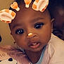 Za'Nyla is registered to the contest to win money with this photo: baby, child, face, pillow, panda, cute, filter, ears, antennae, heart, indoor, person, clothing, infant, portrait, soft_lighting, closeup, resting, black_hair, expression