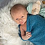 baby, basket, bedding, blanket, blue_blanket, closeup, cozy, cute, face, fur_rug, head, infant, newborn, newborn_photography, plush_toy, portrait, skin, sleepy, stuffed_bear, swaddle