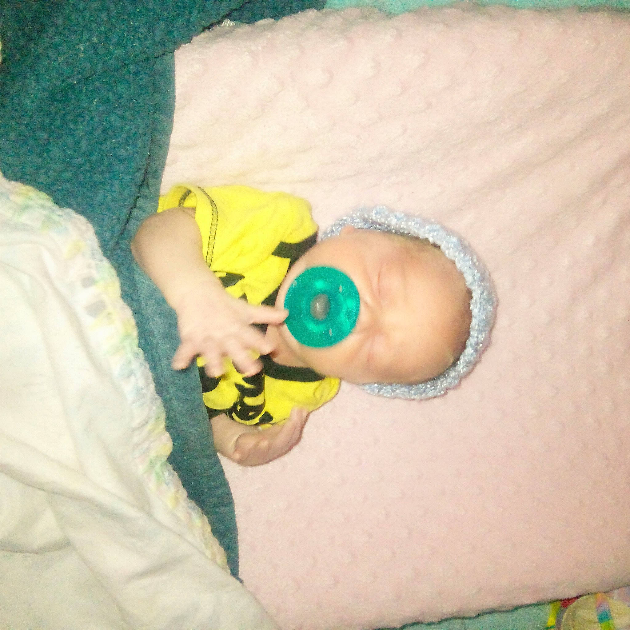 Cash is registered to the contest to win money with this photo: abdomen, arm, baby, baby_products, baby_sleeping, baby_toddler_clothing, comfort, diaper, finger, foot, hand, head, human_body, knee, leg, nail, person, skin, thigh, thumb