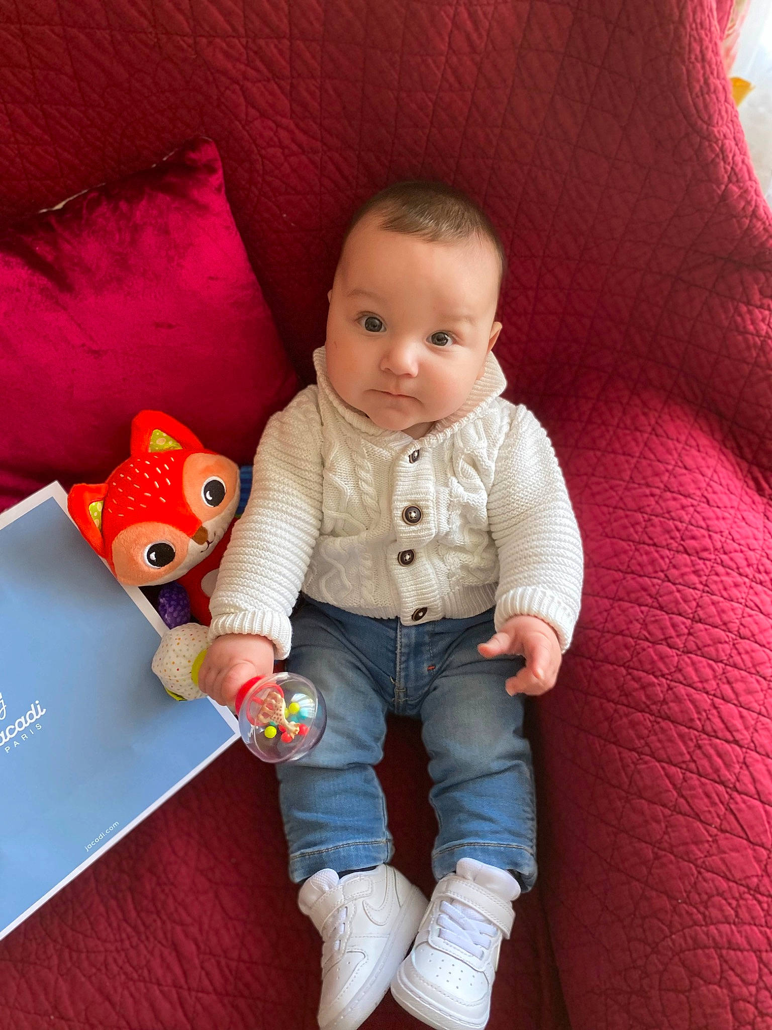 Charlie participe au concours pour gagner de l'argent avec cette photo : baby, baby_toddler_clothing, cheek, child, comfort, doll, facial_expression, human_leg, joint, knee, lip, mammal, nose, person, pink, skin, sleeve, sock, textile, toddler