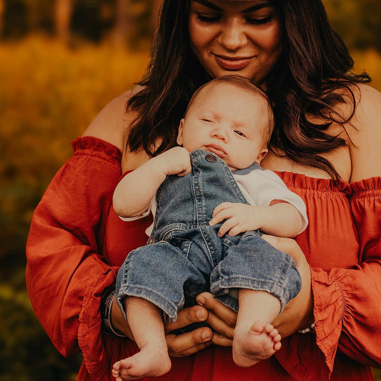 Jaxson J is registered to the contest to win money with this photo: autumn, baby, barefoot, casual_clothing, child, closeup, denim_overalls, family, happy, holding, love, nature, off_shoulder_dress, outdoor, person, portrait, smile, tenderness, warm_colors, woman