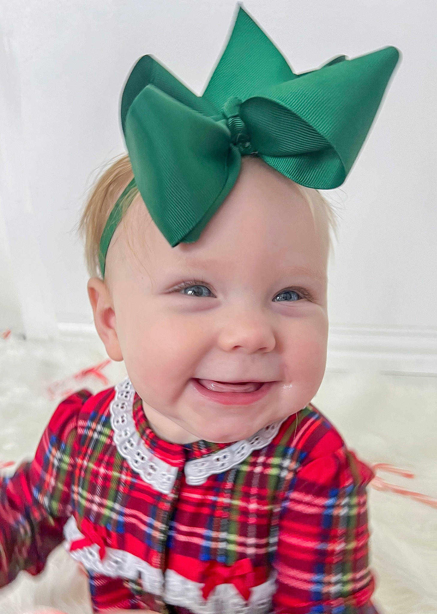 Briar is registered to the contest to win money with this photo: baby_toddler_clothing, cap, child, costume_hat, design, event, face, fashion_accessory, fun, happy, head, headgear, headwear, joy, pattern, person, plaid, sleeve, smile, tartan
