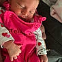 baby, sleeping, pink_overalls, white_shirt, hearts_pattern, blanket, soft_texture, infant, cute, peaceful, hand, face, closed_eyes, cozy, warm, child, newborn, resting, indoors, comfort