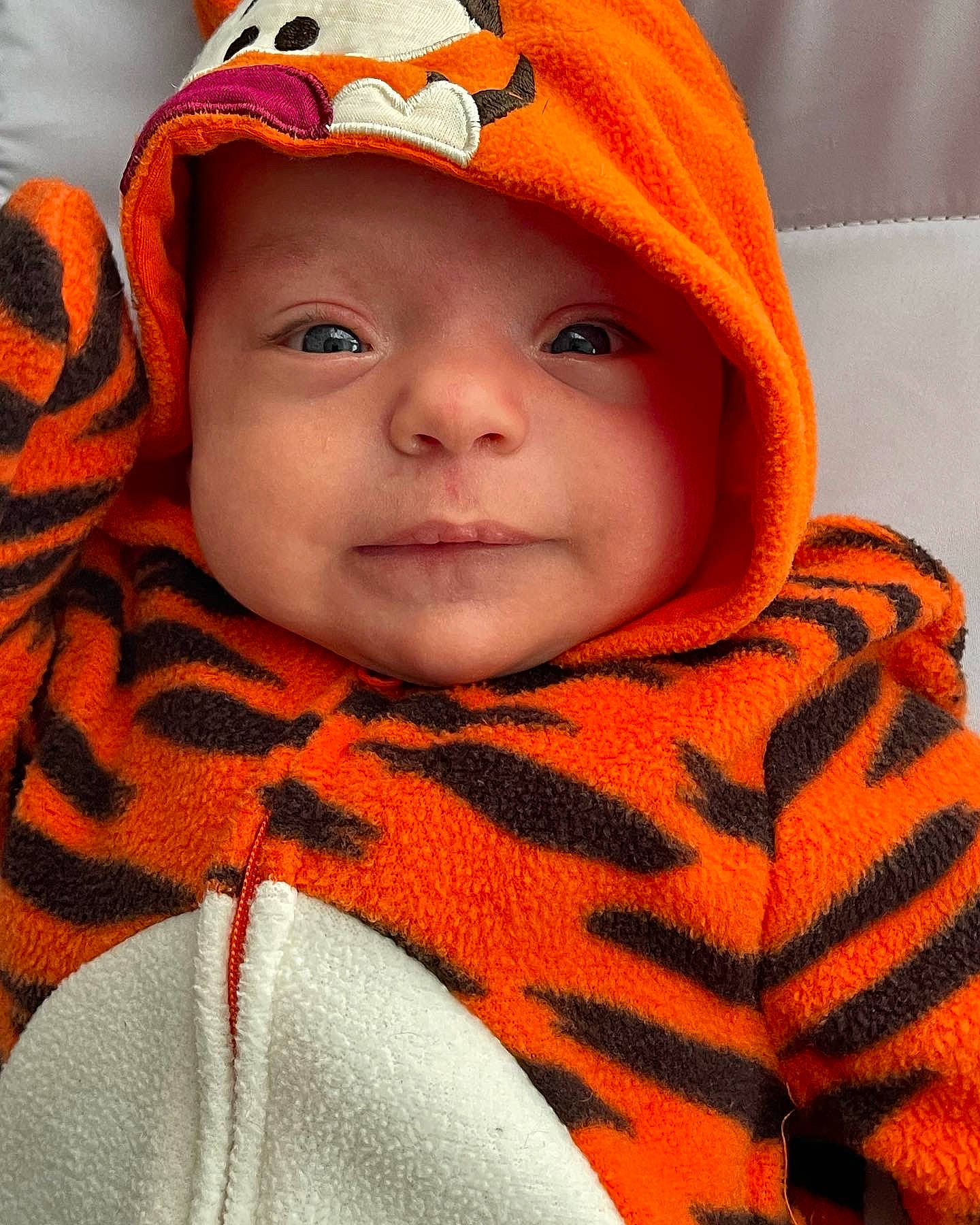 Alex is registered to the contest to win money with this photo: baby, baby_toddler_clothing, cap, cheek, child, chin, collar, cool, eyebrow, face, goggles, happy, headgear, headwear, lip, orange, outerwear, person, sleeve, textile