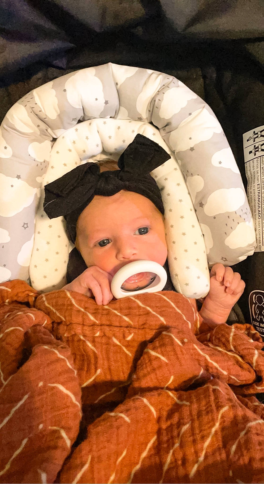 Oaklynn is registered to the contest to win money with this photo: baby, baby_products, baby_safety, baby_sleeping, baby_toddler_clothing, brown, cheek, child, comfort, flesh, hat, head, headgear, headwear, human, linens, mouth, peach, person, skin