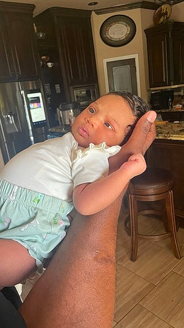 True Brielle joined the competition — help win amazing prizes! abdomen, baby, cheek, chest, chin, clock, comfort, elbow, finger, flooring, joint, knee, leg, mouth, neck, person, picture_frame, shoulder, thigh, thumb