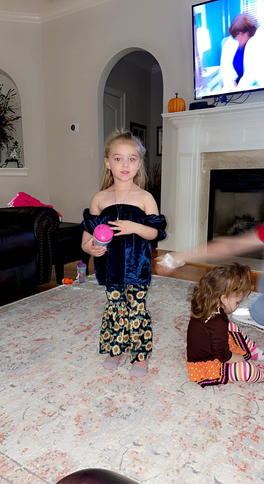 Ella joined the competition — help win amazing prizes! baby_toddler_clothing, fashion, fawn, floor, flooring, fun, hairstyle, joint, living_room, person, picture_frame, pink, purple, shoulder, sleeve, t_shirt, television, thigh, toddler, trunk