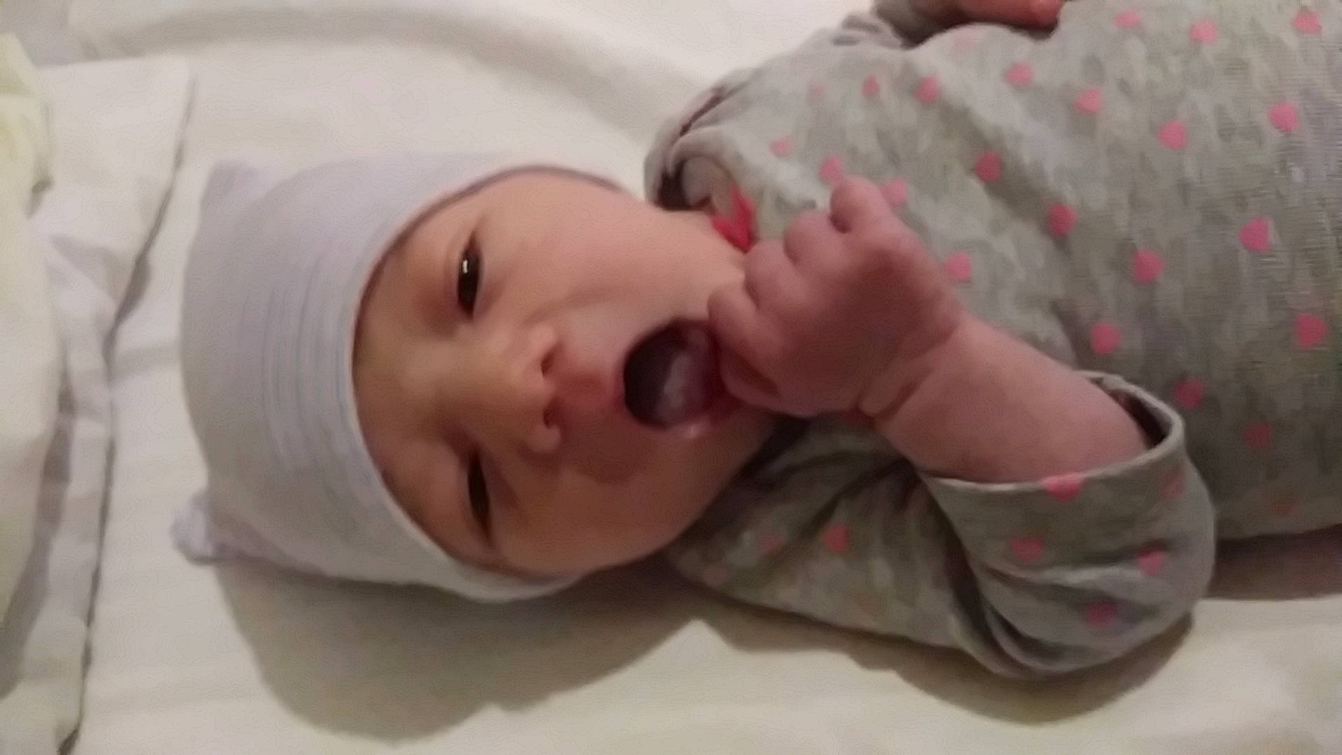 Valkyrie is registered to the contest to win money with this photo: baby, bedtime, cheek, child, childbirth, close_up, ear, eye, facial_expression, finger, hand, head, headwear, mouth, nap, nose, person, skin, sleep, smile