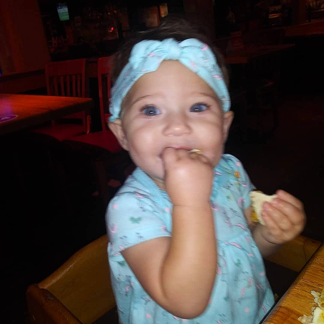 Aaliyah joined the competition — help win amazing prizes! baby, cheek, child, face, finger, fun, head, headgear, headwear, mouth, nose, person, smile, thumb, toddler