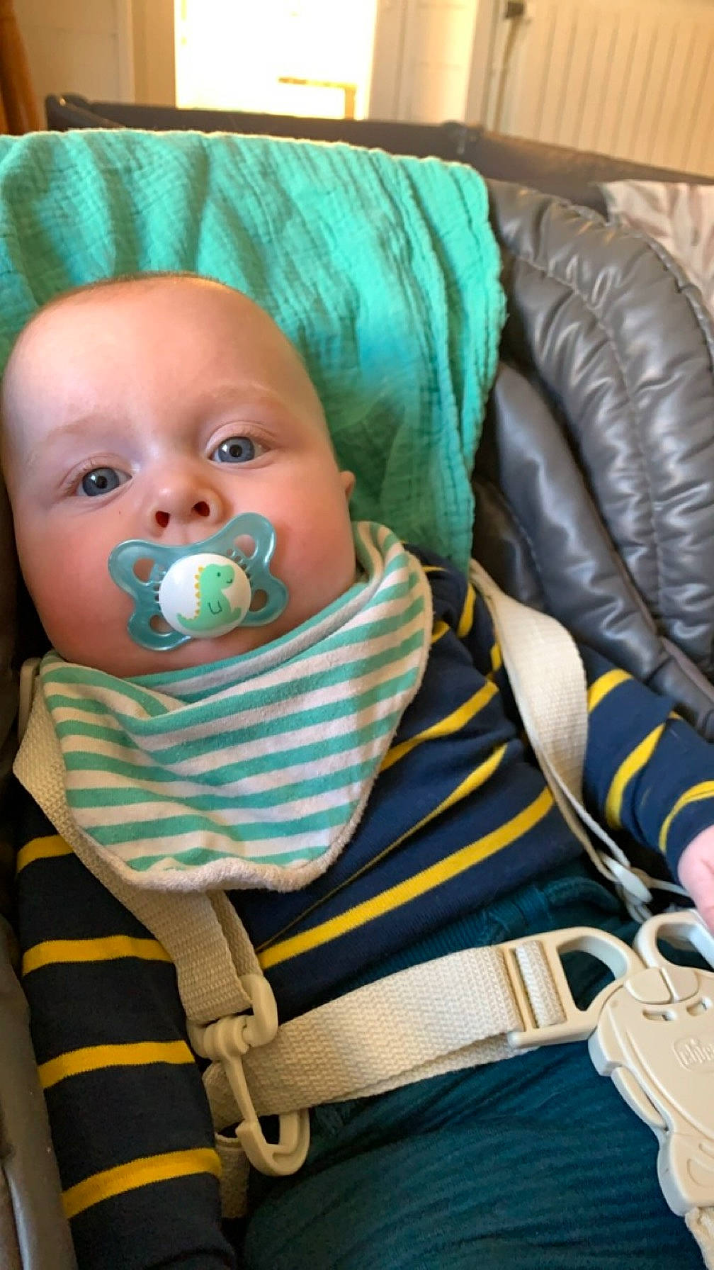 Logan participe au concours pour gagner de l'argent avec cette photo : baby, baby_products, baby_safety, baby_toddler_clothing, cheek, child, comfort, couch, iris, linens, pattern, person, personal_protective_equipment, room, sitting, textile, toddler