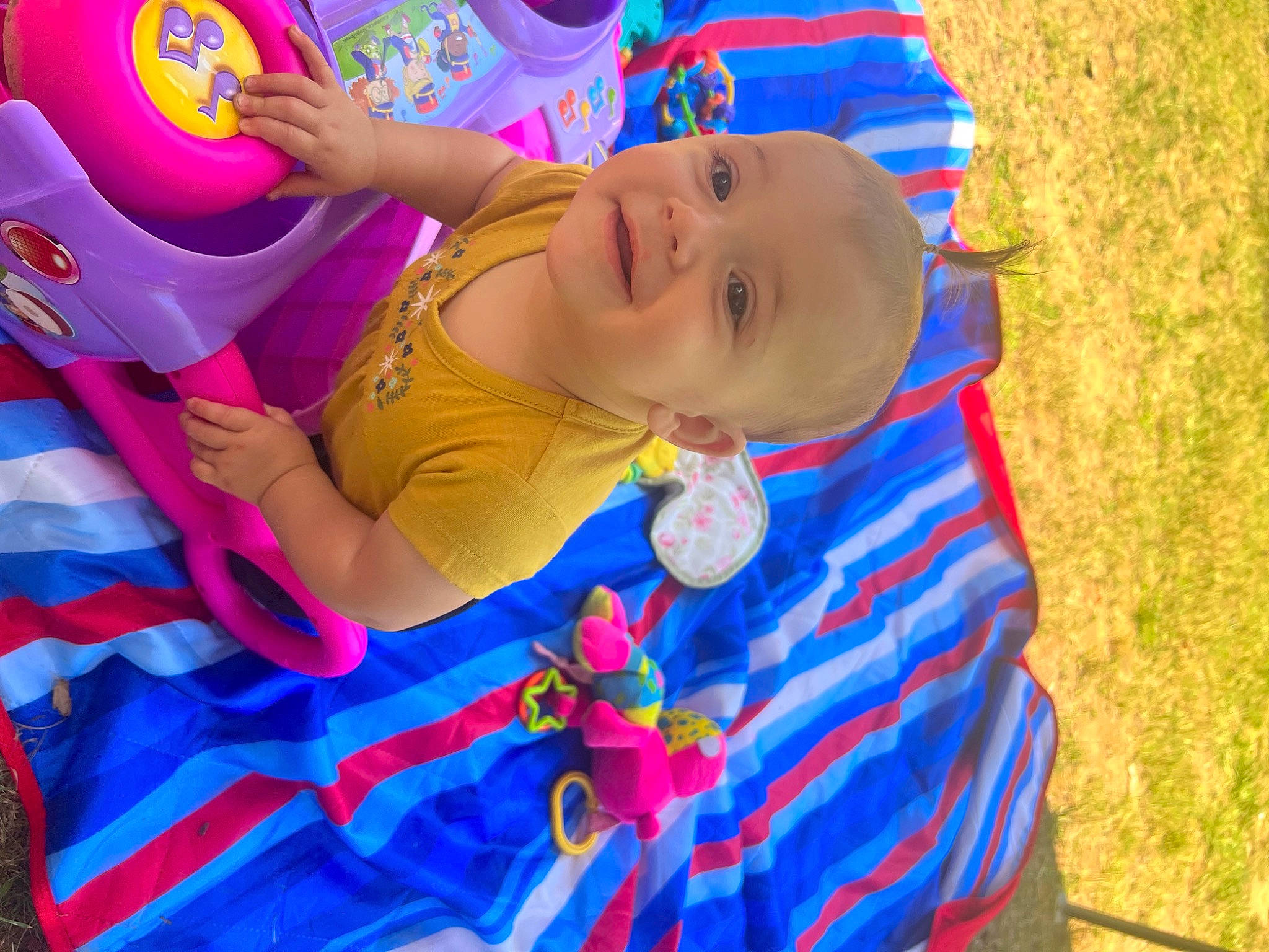 Haisley joined the competition — help win amazing prizes! baby, baby_products, baby_toddler_clothing, child, electric_blue, event, fun, grass, happy, hat, joy, leisure, magenta, pattern, person, pink, play, recreation, red, smile