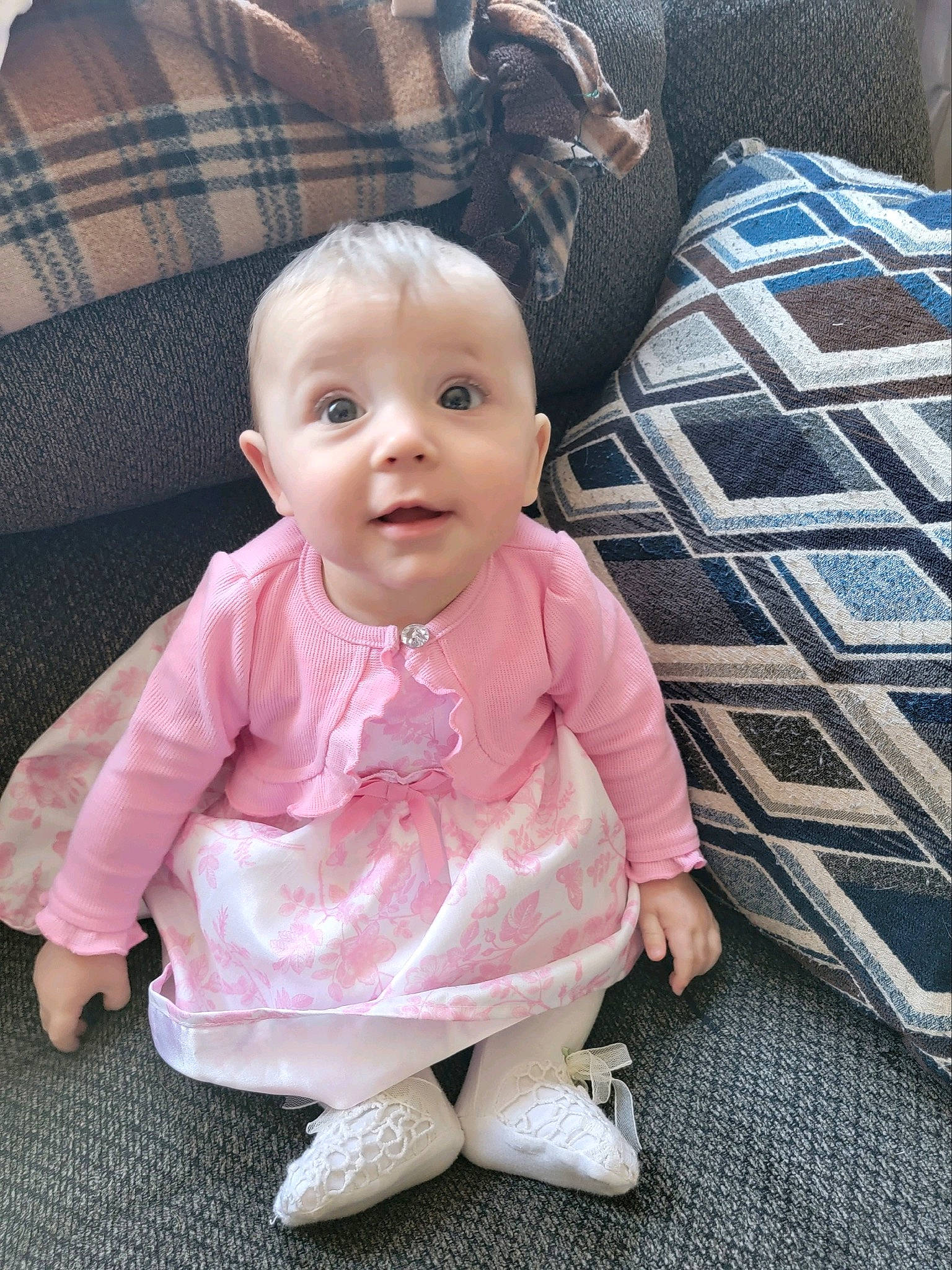 Haisley joined the competition — help win amazing prizes! baby, baby_products, baby_toddler_clothing, bag, cheek, child, comfort, couch, dress, floor, flooring, furniture, linens, person, pink, product, sitting, skin, sleeve, textile