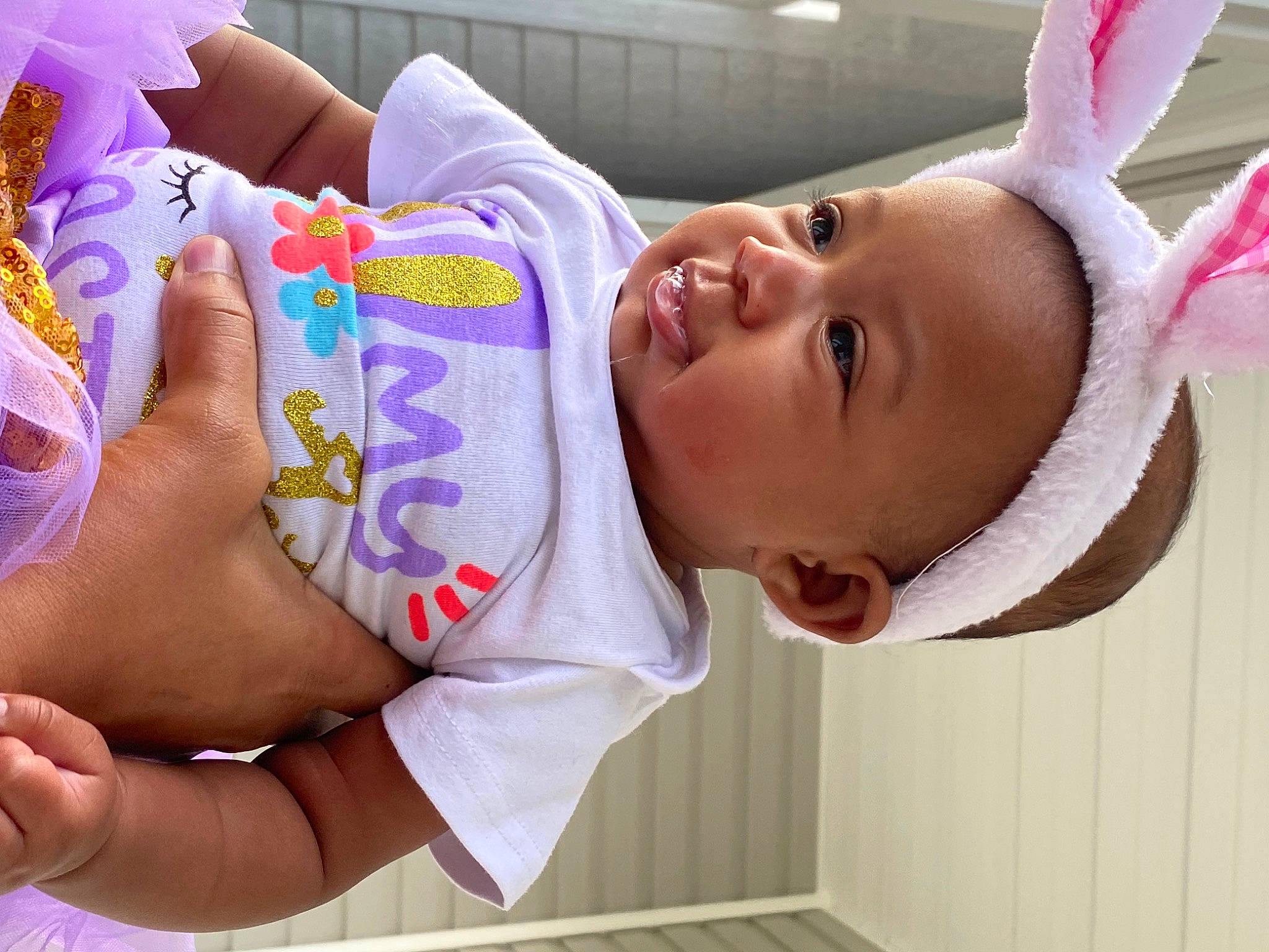 Mia joined the competition — help win amazing prizes! baby, baby_toddler_clothing, cheek, ear, eyelash, facial_expression, finger, hand, happy, human_body, mouth, nail, neck, nose, person, pink, product, skin, smile, thumb