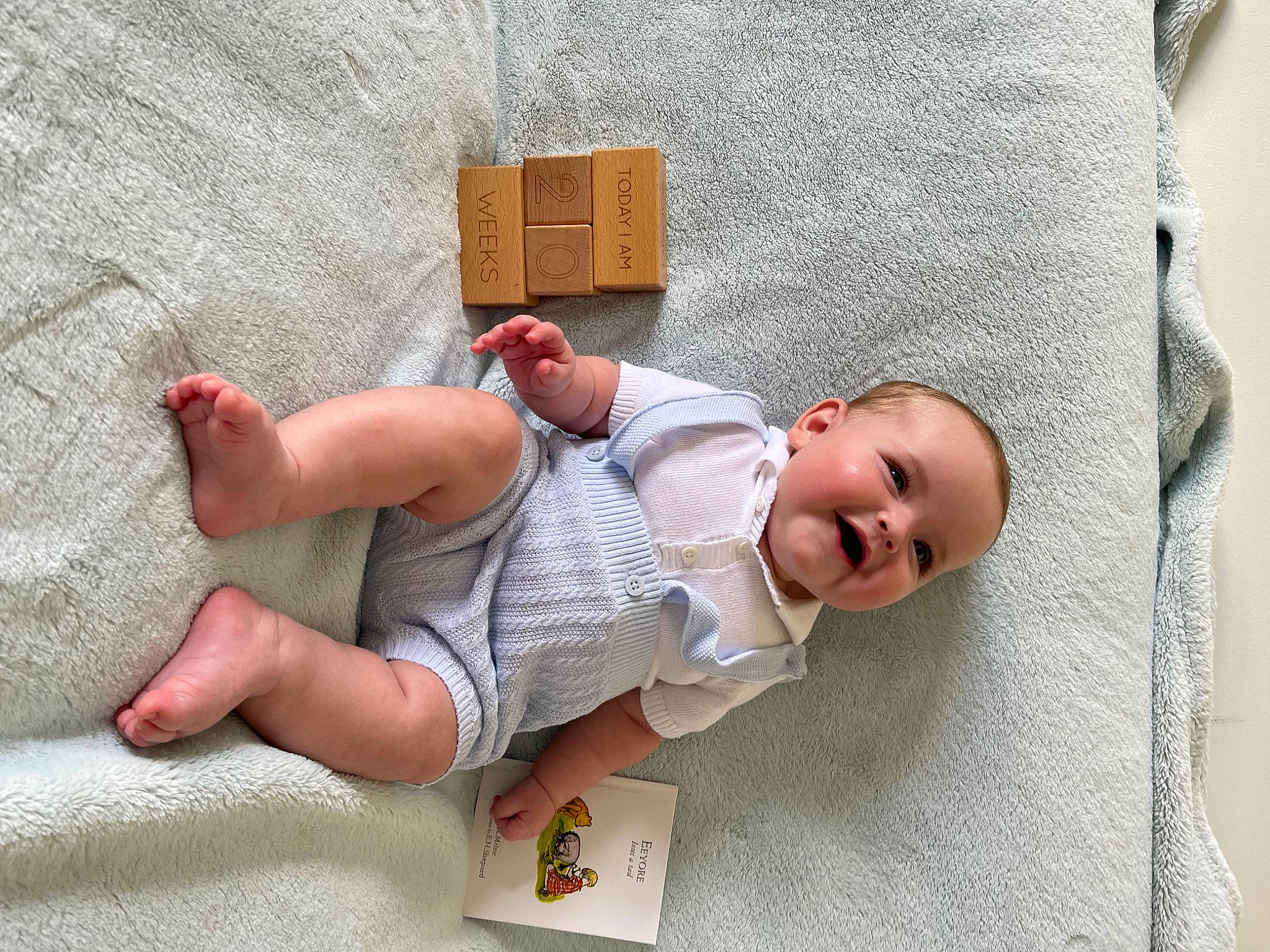 Theo is registered to the contest to win money with this photo: baby, baby_sleeping, baby_toddler_clothing, chair, child, comfort, elbow, foot, human_body, human_leg, joint, knee, linens, person, room, sleeve, textile, thigh, toddler, wood