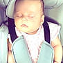baby, sleeping, car_seat, child, infant, seatbelt, clothing, pink, face, head, hands, safety, rest, peaceful, transportation, young_child, closeup, portrait, seat, baby_carrier