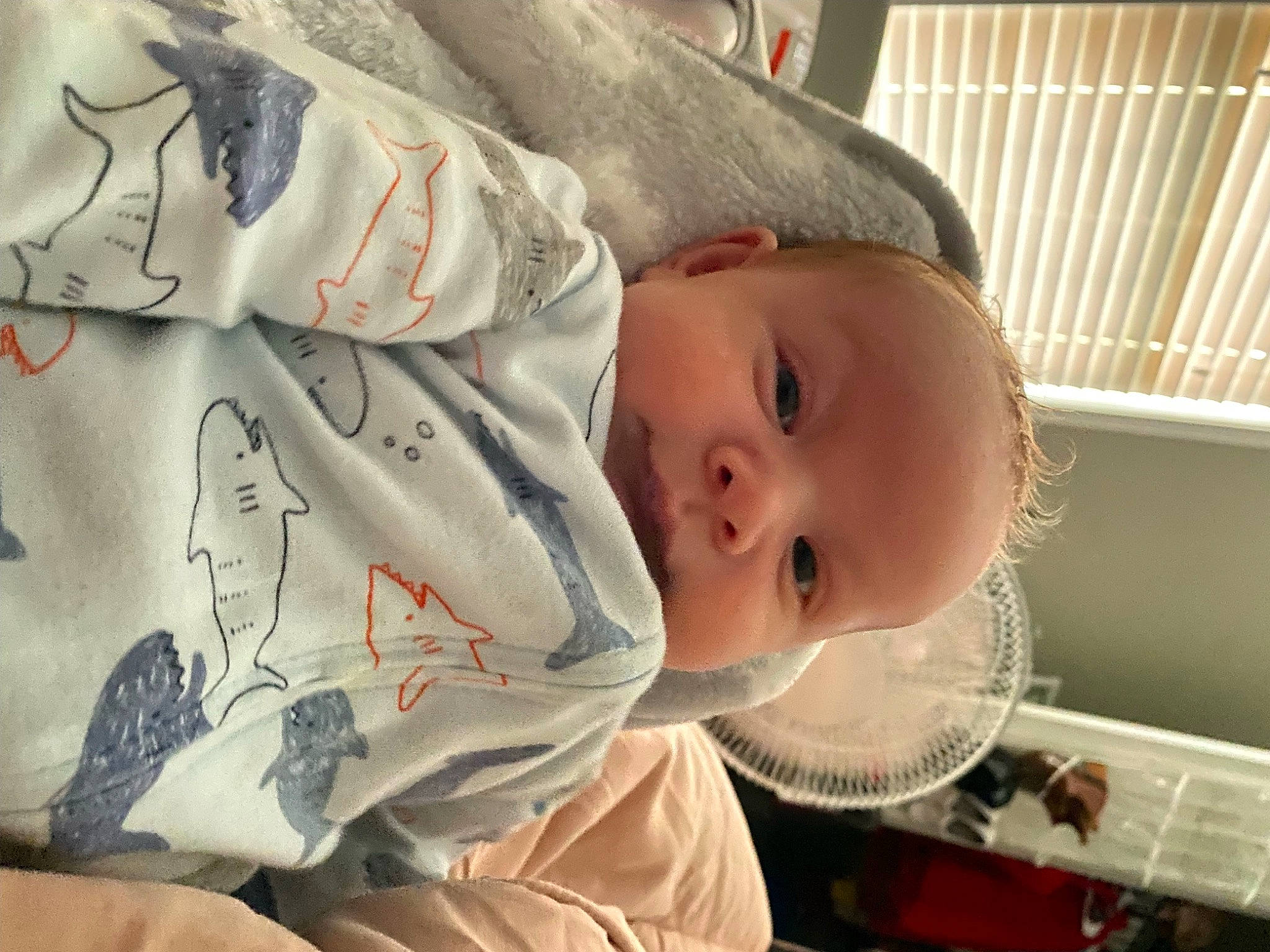 Jaden is registered to the contest to win money with this photo: baby, baby_products, baby_safety, baby_toddler_clothing, carmine, cheek, child, comfort, eye, facial_expression, head, linens, mammal, mouth, nose, person, skin, sleeve, textile, toddler