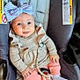baby, child, car_seat, bow, smile, pink_pants, beige_sweater, white_socks, infant, cute, happy, seated, indoors, clothing, face, hand, toy, accessory, portrait, person