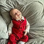 Luca-Lee joined the competition — help win amazing prizes! baby, bow_tie, child, clothing, comfort, couch, cozy, cute, gray_cushion, happy, indoor, infant, person, portrait, red_pants, red_vest, relaxing, smiling, socks, soft