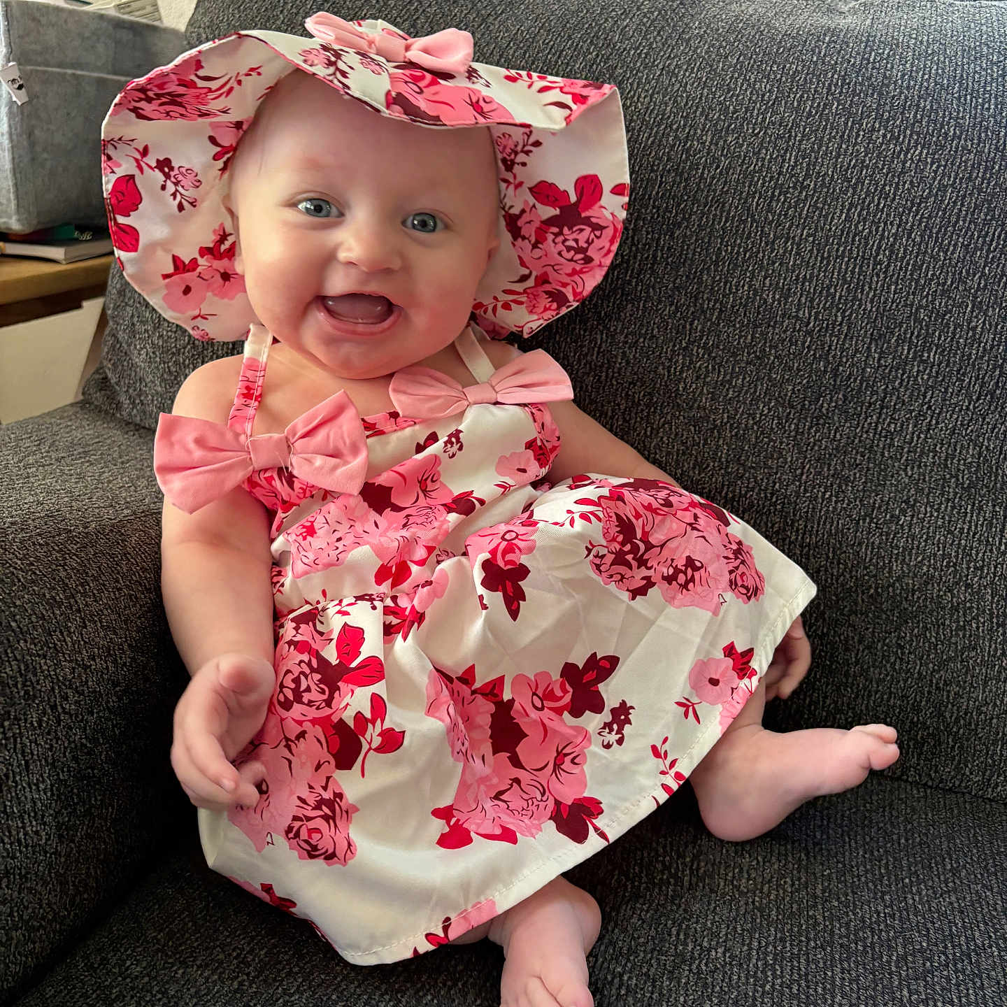 Natalie joined the competition — help win amazing prizes! accessories, baby, bag, bonnet, cap, clothing, couch, cushion, dress, face, furniture, handbag, hat, head, homedecor, person, photography, portrait, sitting, sunhat