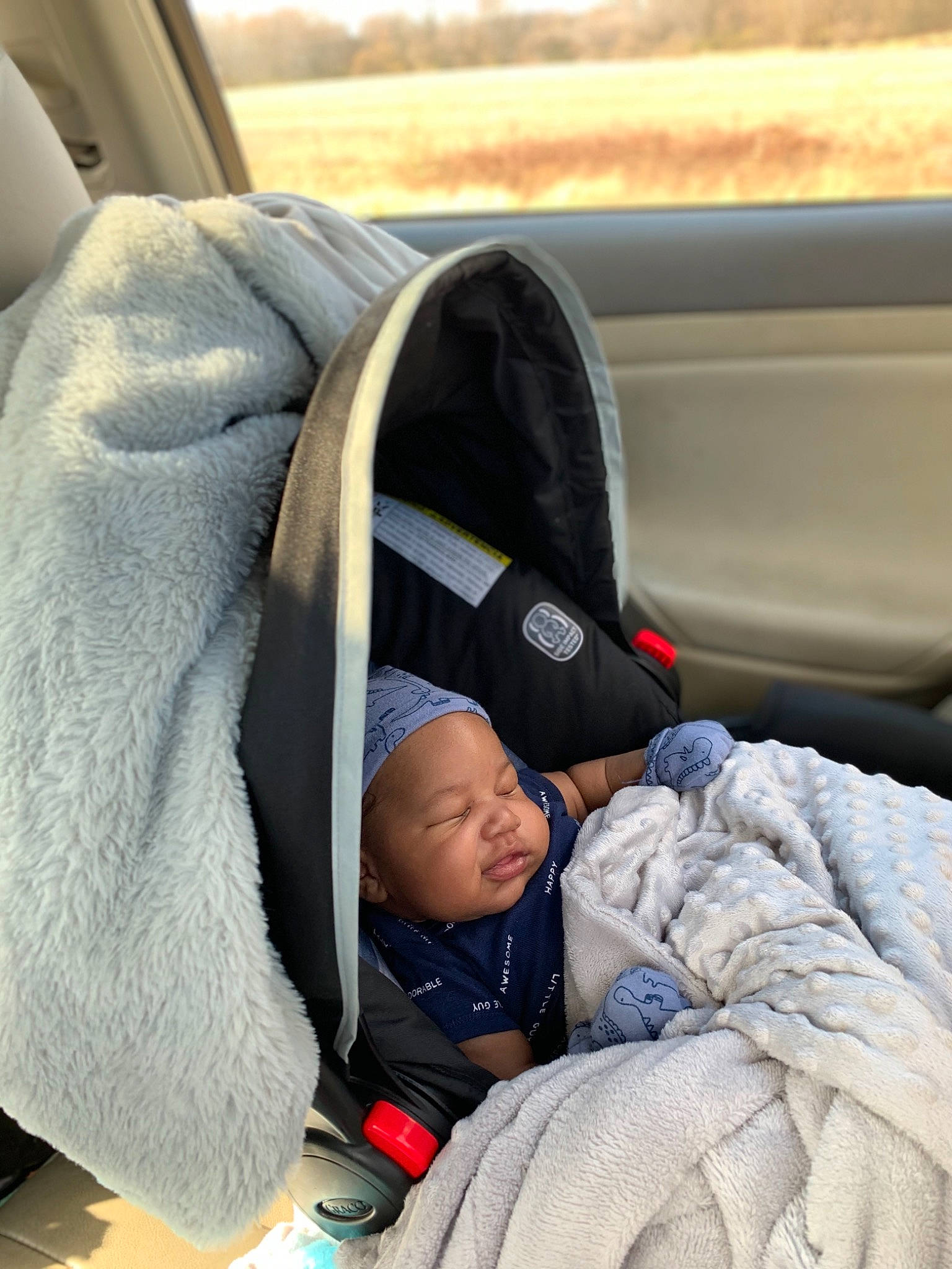 Deangelo joined the competition — help win amazing prizes! baby, baby_carriage, baby_in_car_seat, baby_products, baby_safety, baby_sleeping, baby_toddler_clothing, bedtime, blanket, car_seat, car_seat_cover, child, comfort, head_restraint, nap, person, plastic_bottle, product, sleep, toddler