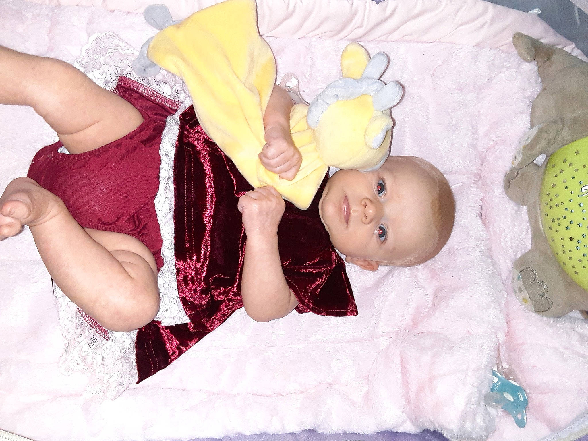 Embrie joined the competition — help win amazing prizes! baby, baby_products, baby_sleeping, baby_toddler_clothing, child, comfort, dress, embellishment, gesture, happy, head, headgear, human_leg, linens, person, pink, purple, skin, thigh, toddler