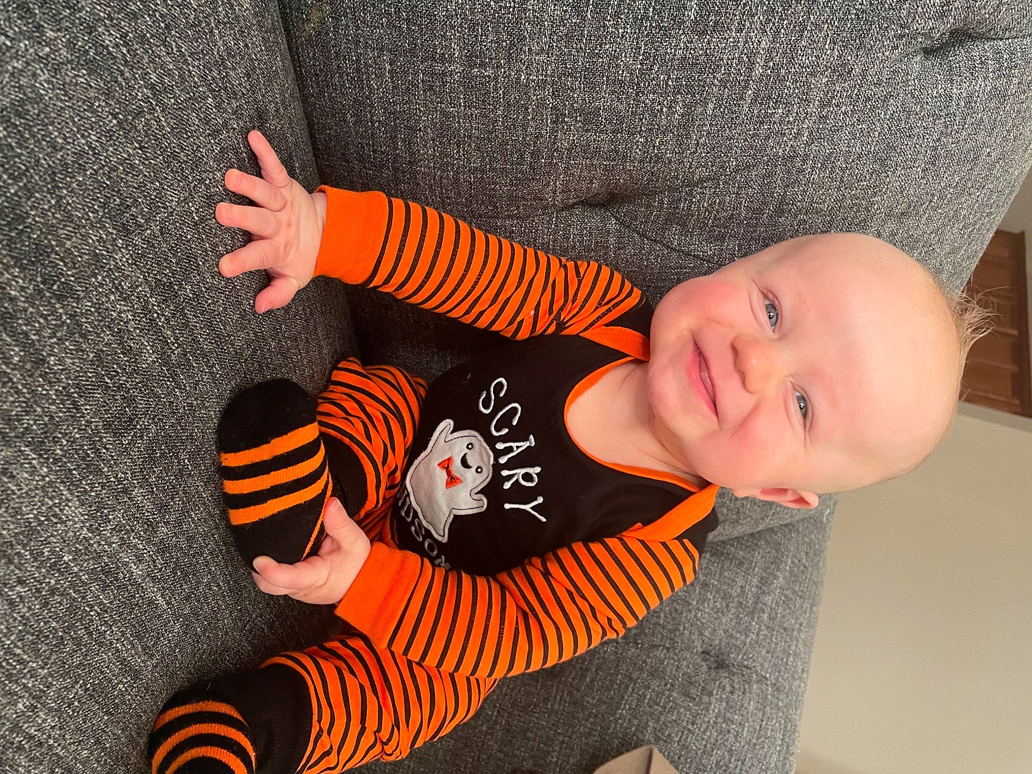 Emmerson joined the competition — help win amazing prizes! arm, baby, baby_toddler_clothing, child, clothing, cool, facial_expression, finger, fun, happy, headgear, orange, pattern, people, person, product, sleeve, smile, t_shirt, textile