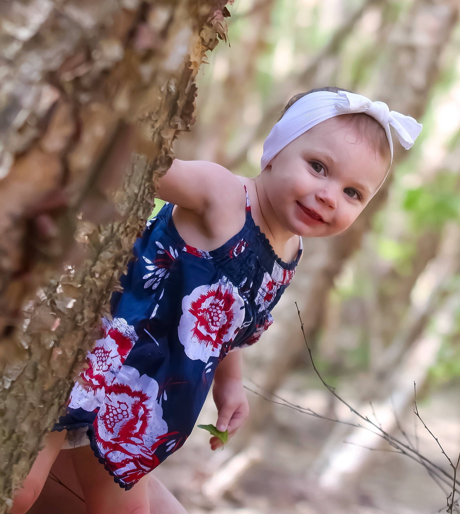 Oaklee joined the competition — help win amazing prizes! beauty, branch, child, electric_blue, eye, forest, fun, grass, happy, head, joy, leaf, leisure, people_in_nature, person, plant, skin, toddler, tree, twig