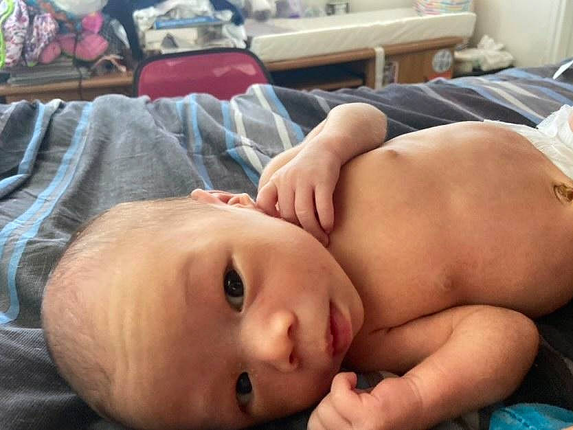 Declan joined the competition — help win amazing prizes! abdomen, baby, bag, cheek, chest, child, comfort, eye, eyebrow, eyelash, linens, lip, luggage_and_bags, mouth, muscle, nose, person, skin, textile, toddler