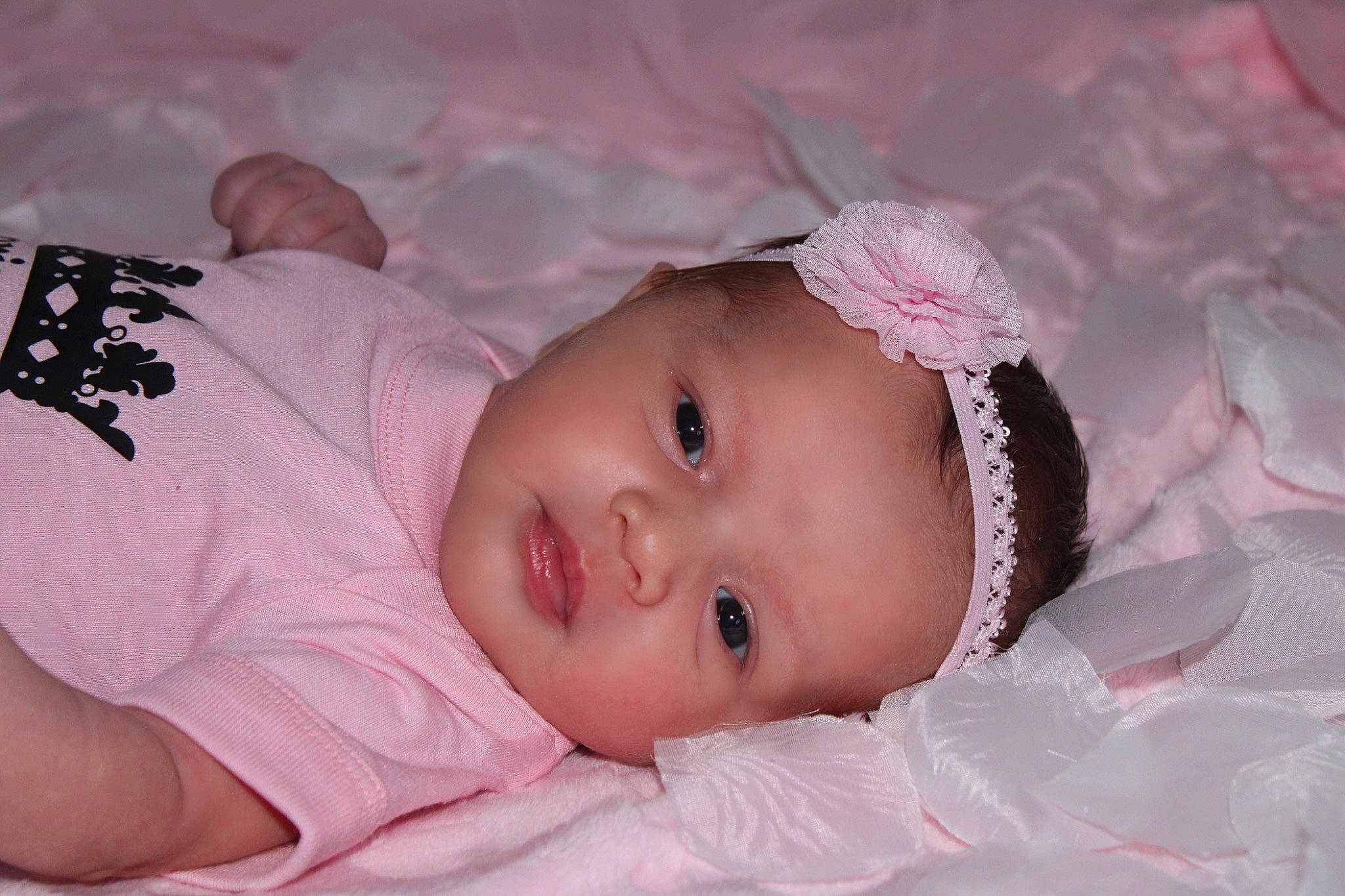 Mila joined the competition — help win amazing prizes! baby, baby_toddler_clothing, cheek, child, chin, dress, eye, eyebrow, eyelash, face, hair_accessory, happy, headgear, headwear, iris, lip, person, pink, skin, sleeve