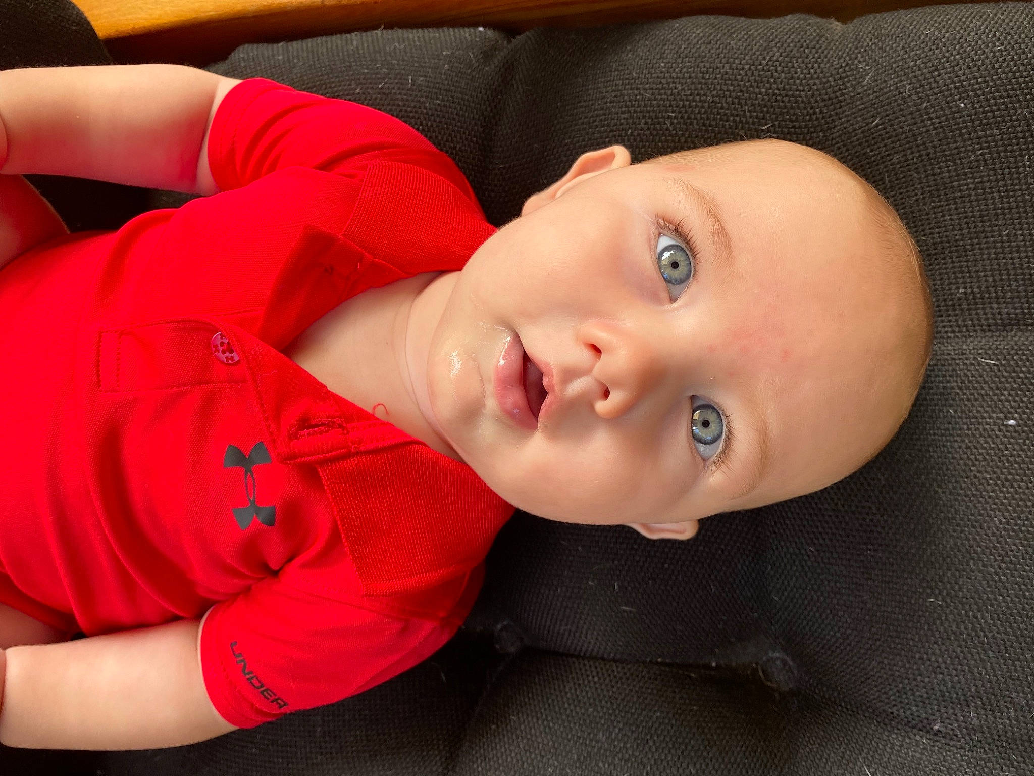 Corbin is registered to the contest to win money with this photo: baby, baby_toddler_clothing, carmine, cheek, child, comfort, elbow, electric_blue, eyebrow, eyelash, flash_photography, iris, lip, nose, person, portrait_photography, sitting, sleeve, smile, toddler
