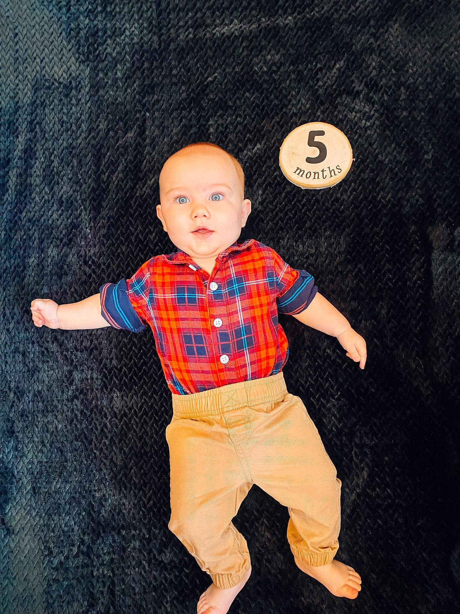 Corbin joined the competition — help win amazing prizes! arm, baby_toddler_clothing, child, cool, doll, electric_blue, finger, gesture, hairstyle, hand, happy, human_body, joint, orange, pattern, person, plaid, sleeve, t_shirt, textile