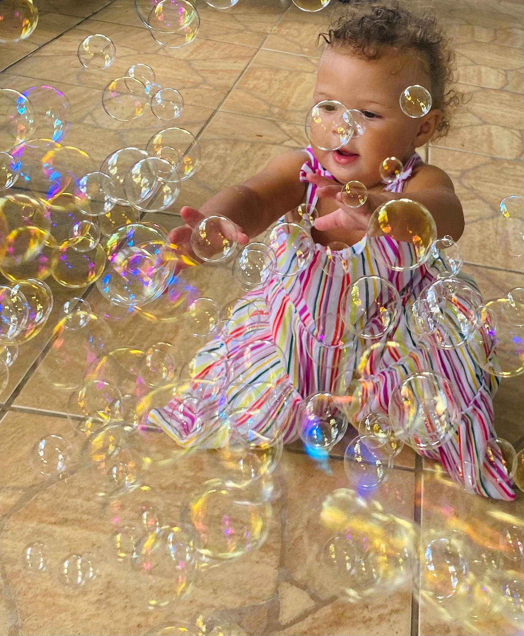 Jailyn is registered to the contest to win money with this photo: basket, bracelet, child, event, fashion_accessory, festival, fun, jewellery, metal, necklace, ornament, pattern, person, sitting, temple, toddler, toy, tradition, tribe, visual_arts